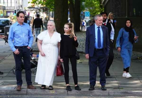 Paula Leeson's brother Neville Leeson (left) and father Willy Leeson (right) appeared outside Manchester Civil Justice Centre this week