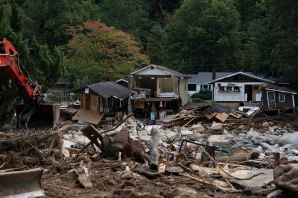 Damaged structures are seen in downtown Chimney Rock, North Carolina, October 2, 2024, after the passage of Hurricane Helene.